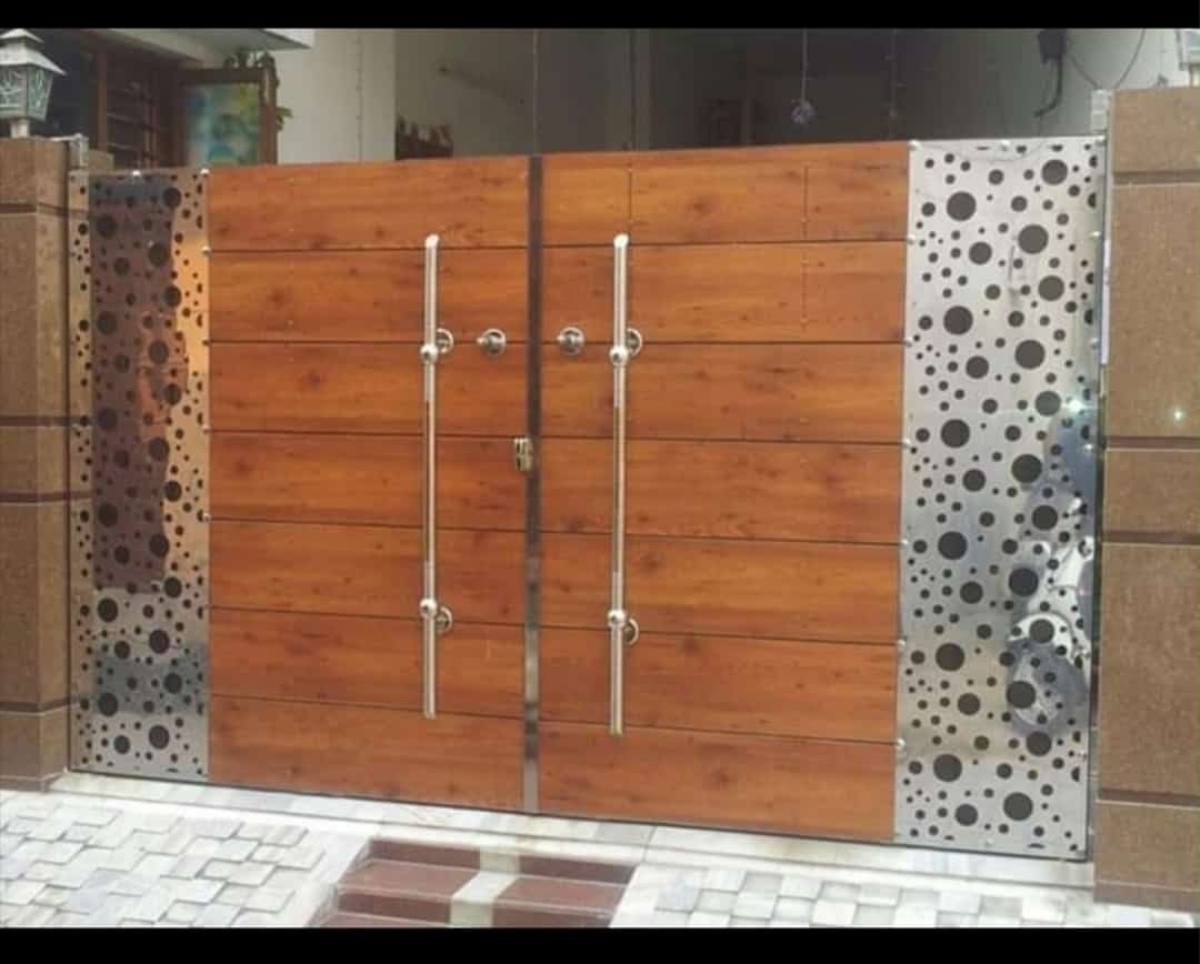 Wood and perforated steel gate