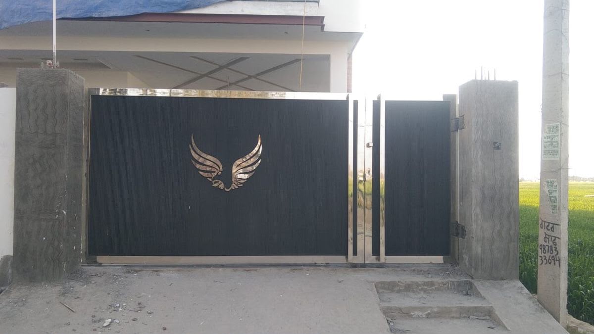 Black gate with golden eagle motif