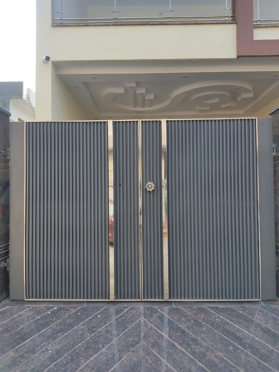 Grey fluted panel steel gate